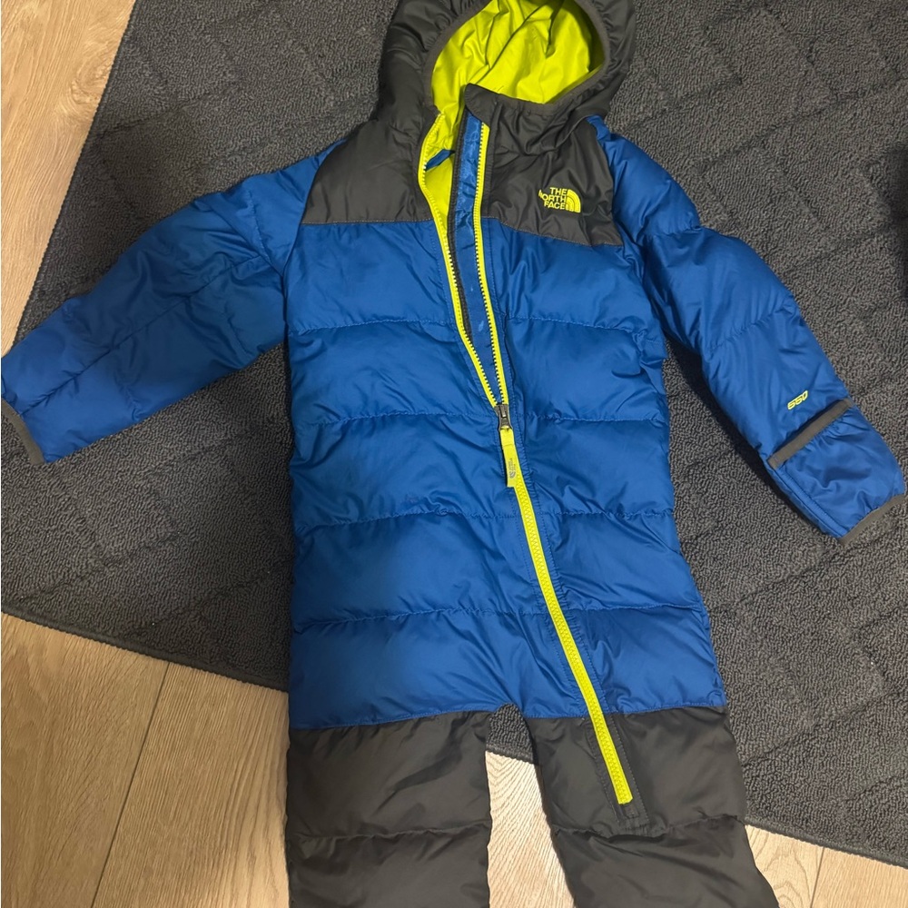 The North Face Infant Snowsuit in Blue and Black with Yellow Accents